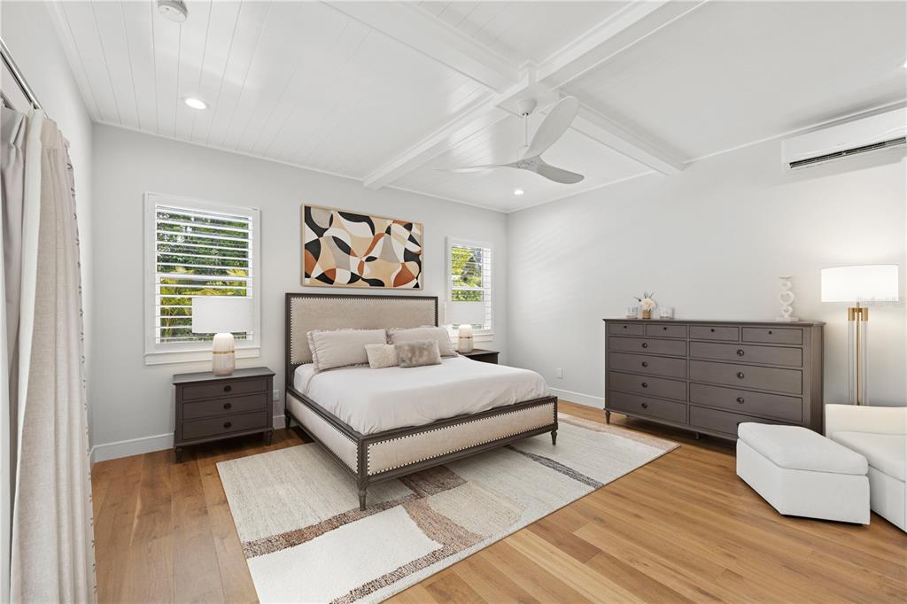 4013 Red Rock Lane Sarasota, FL 34231 - Photo 24 of 60 a bedroom with a bed and a couch