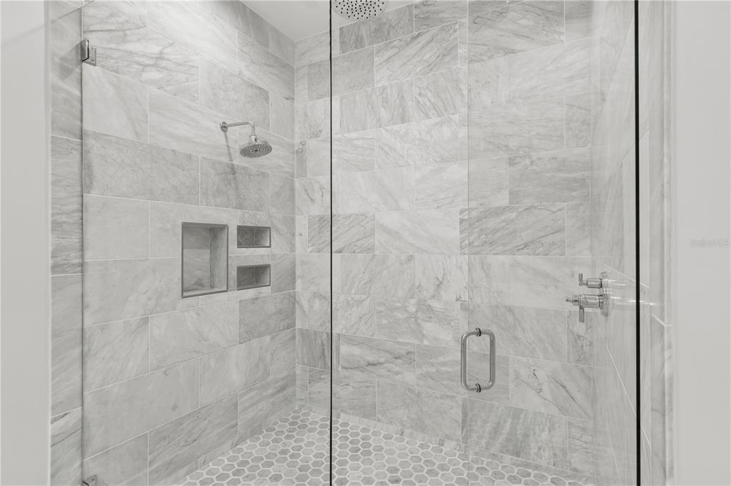4013 Red Rock Lane Sarasota, FL 34231 - Photo 28 of 60 a bathroom with a shower