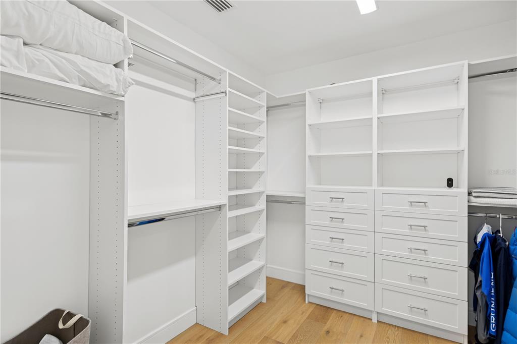 4013 Red Rock Lane Sarasota, FL 34231 - Photo 30 of 60 a view of walk in closet with empty racks