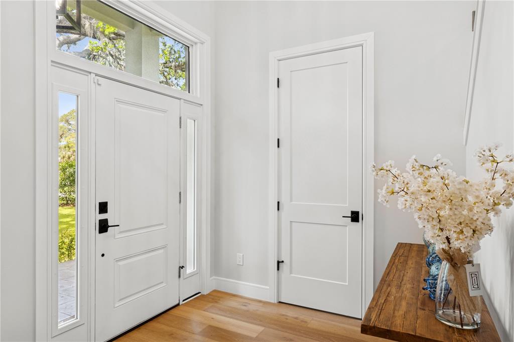 4013 Red Rock Lane Sarasota, FL 34231 - Photo 31 of 60 a view of walk in closet with wooden floor