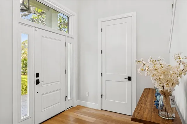 a room with a bed and a view of bedroom