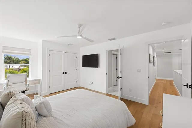 a bathroom with a glass shower door