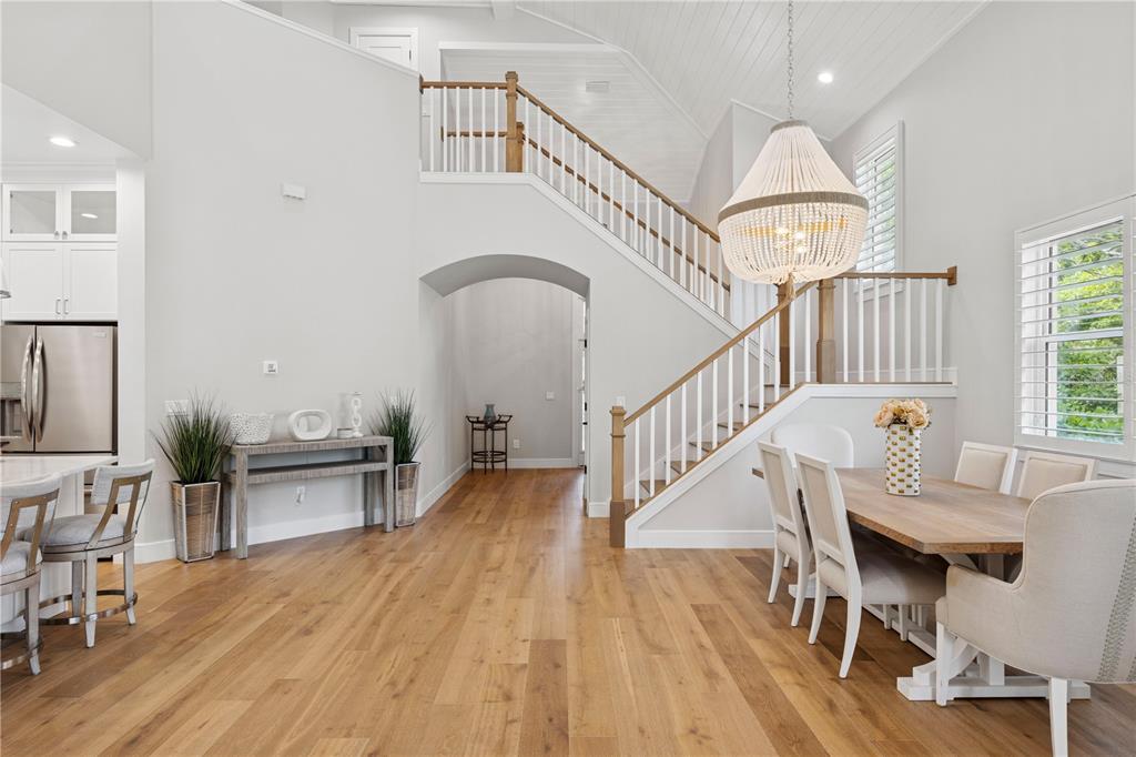 4013 Red Rock Lane Sarasota, FL 34231 - Photo 4 of 60 a view of entryway livingroom and hall with wooden floor