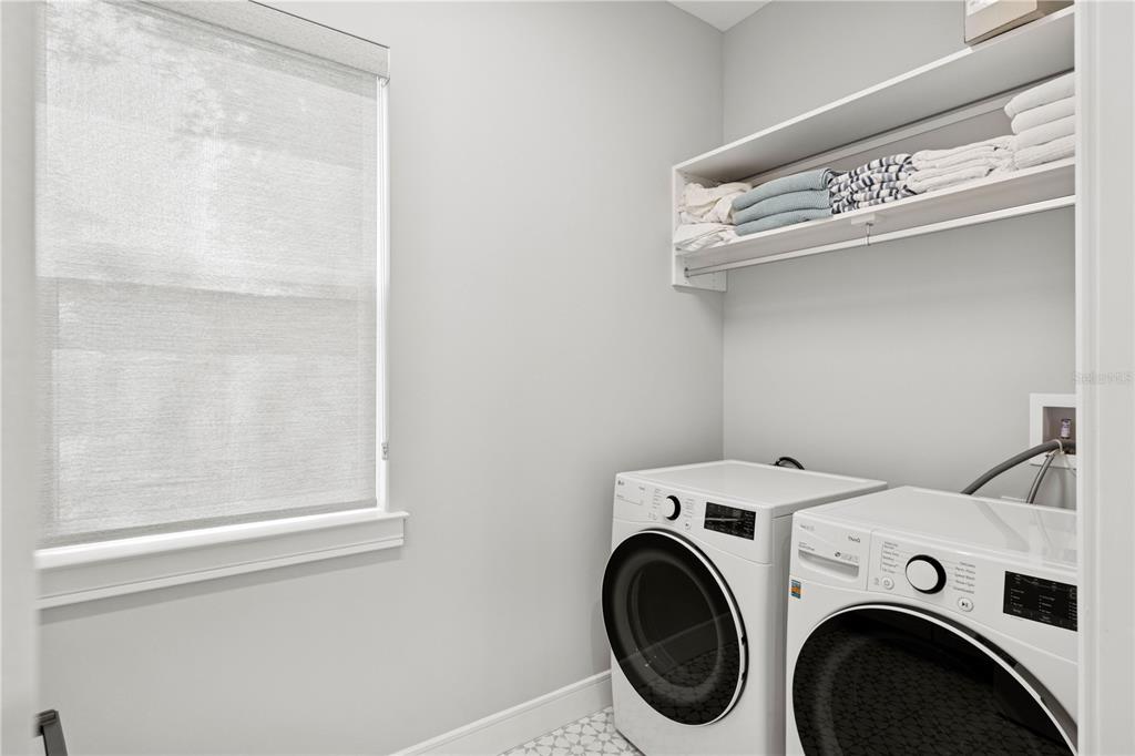 4013 Red Rock Lane Sarasota, FL 34231 - Photo 44 of 60 a utility room with dryer and washer