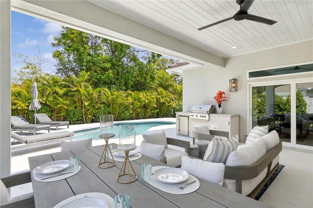 4013 Red Rock Lane Sarasota, FL 34231 - Photo 46 of 60 a living room with furniture and a large window