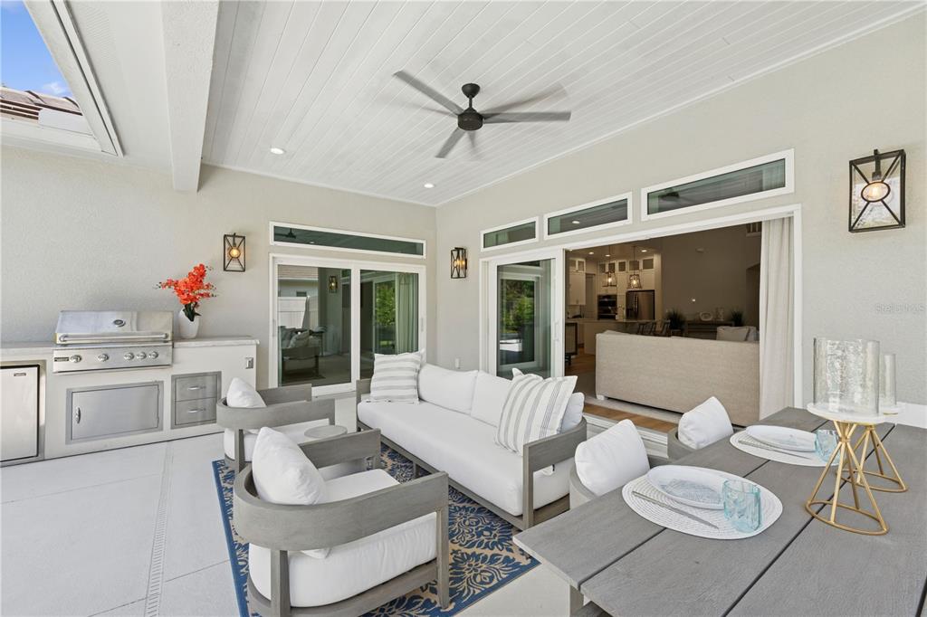 4013 Red Rock Lane Sarasota, FL 34231 - Photo 51 of 60 a living room with furniture and a large window