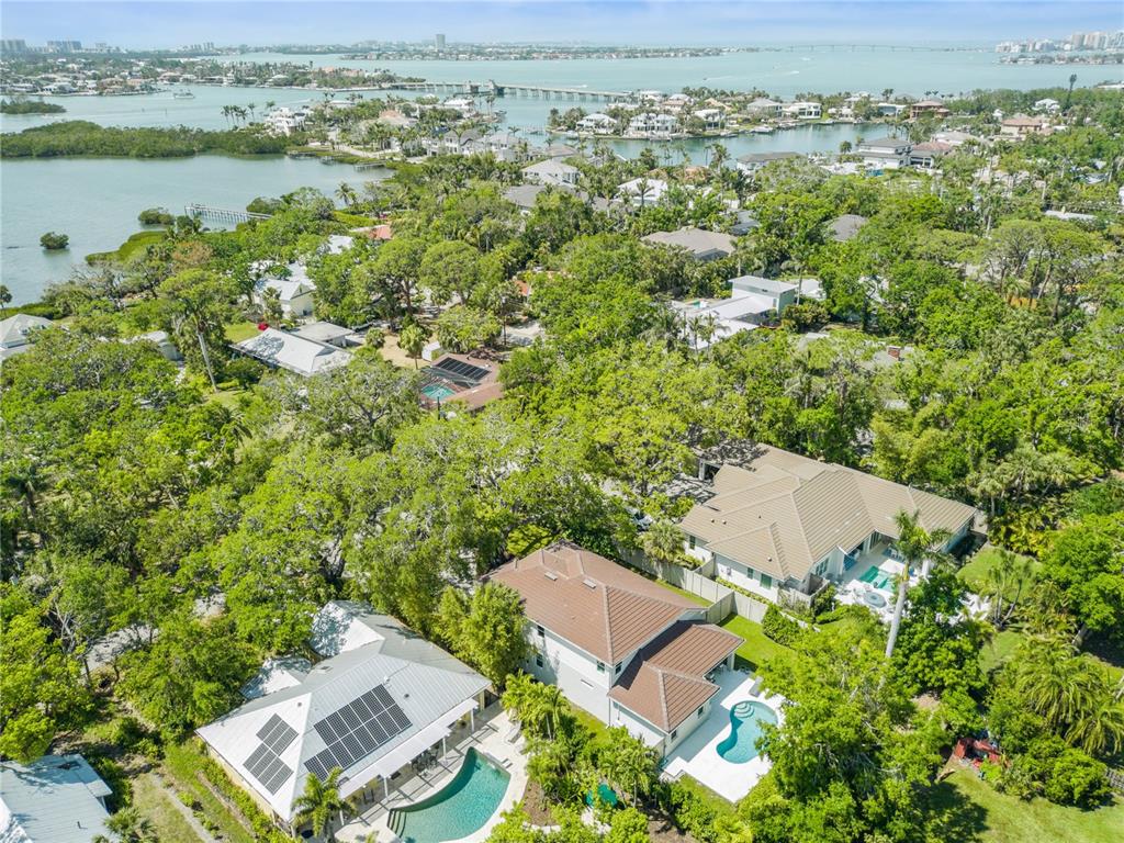4013 Red Rock Lane Sarasota, FL 34231 - Photo 58 of 60 an aerial view of a house with a lake view