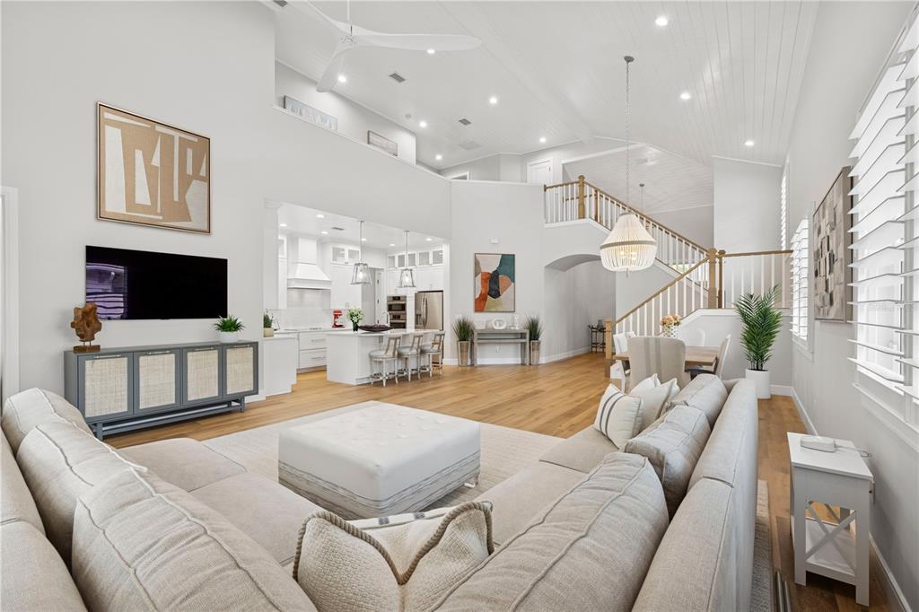 4013 Red Rock Lane Sarasota, FL 34231 - Photo 6 of 60 a bedroom with furniture and a flat screen tv