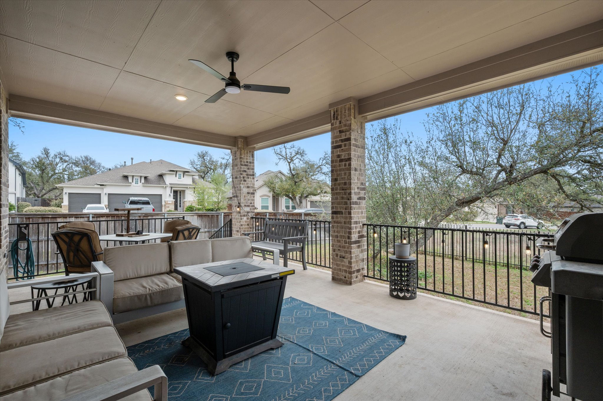 111 Beryl Way Dripping Springs, TX 78620 - Photo 19 of 26 a living room with furniture and a large window