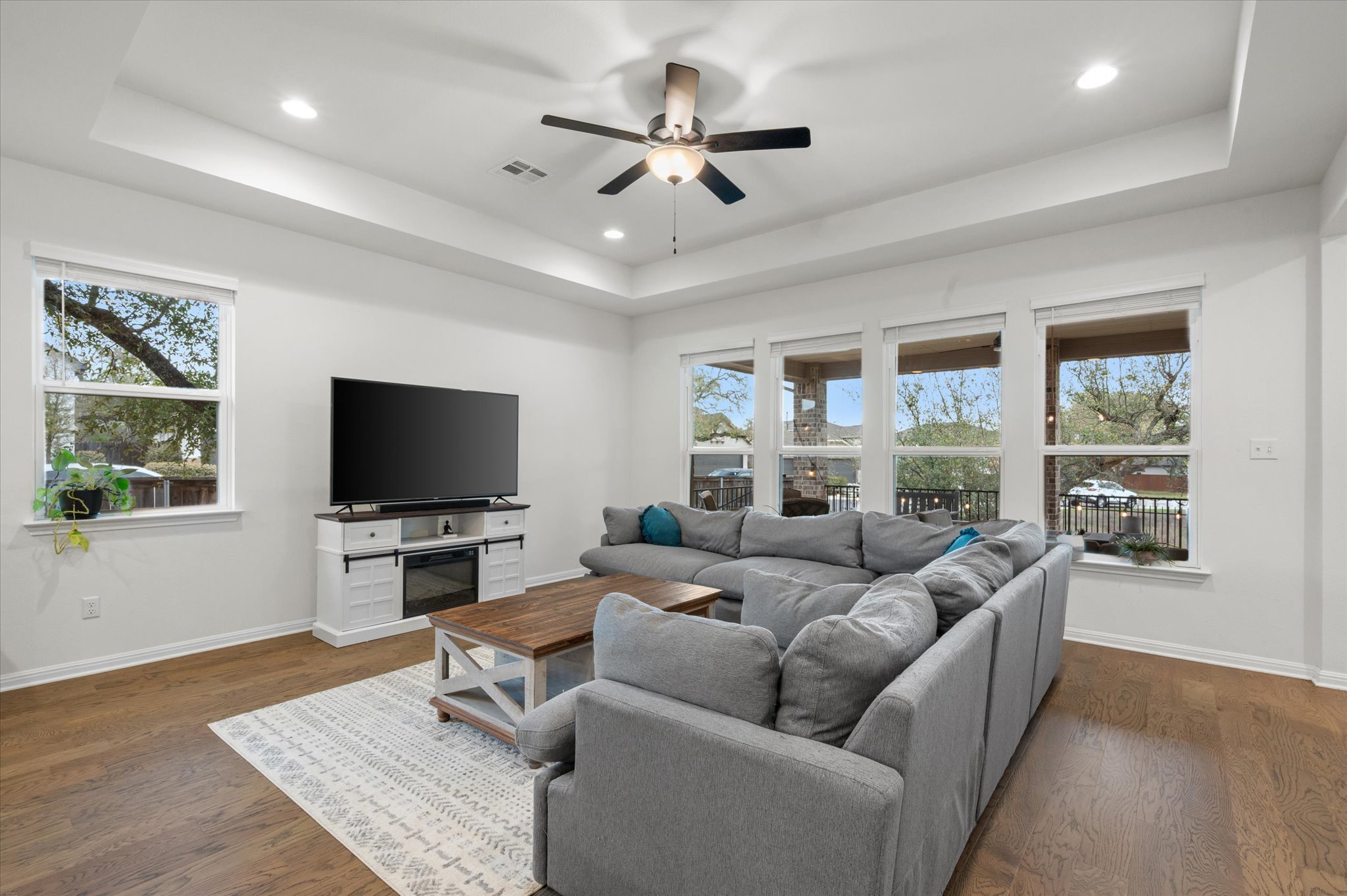 111 Beryl Way Dripping Springs, TX 78620 - Photo 6 of 26 a living room with furniture and a flat screen tv