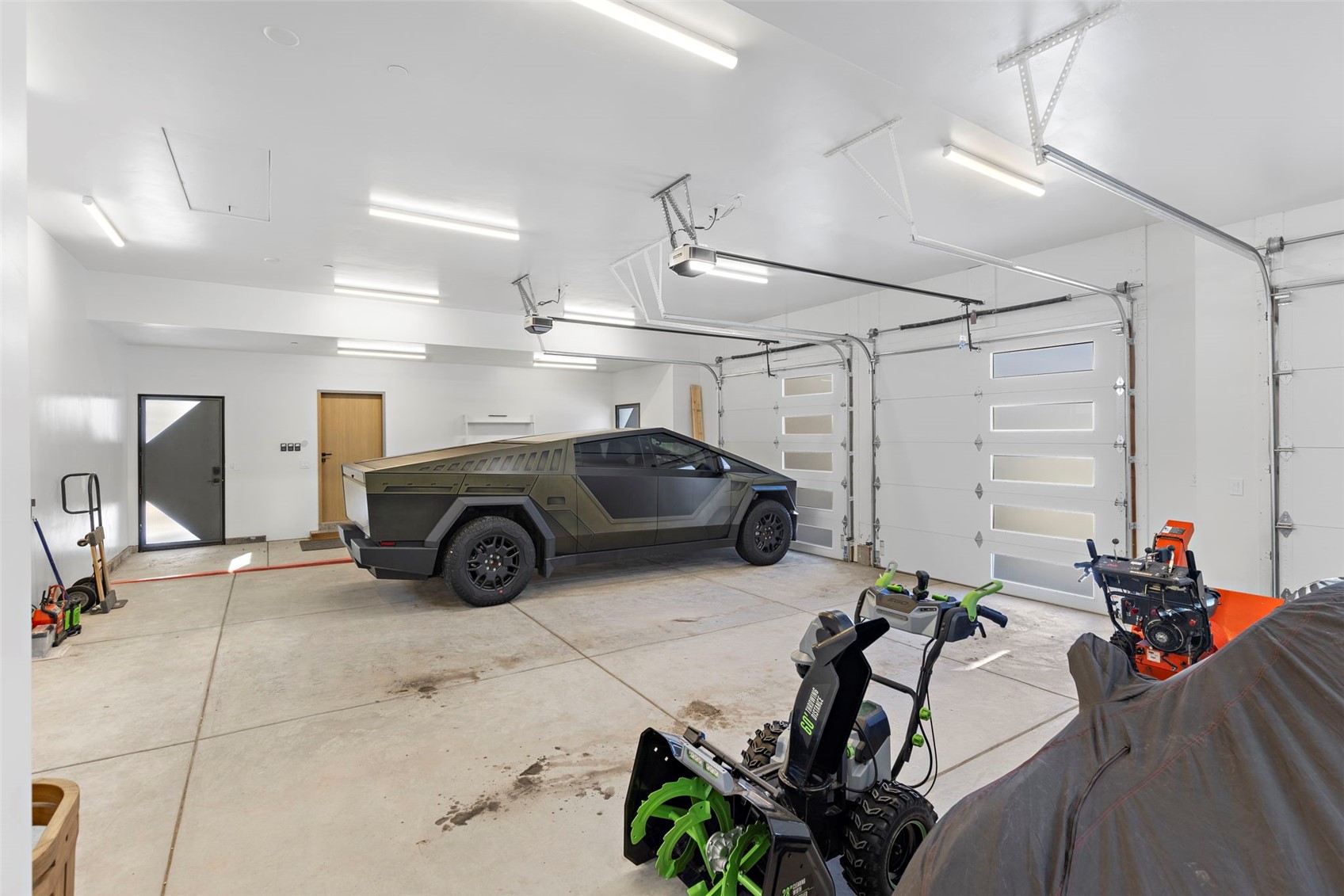 149 Game Trail Road Silverthorne, CO 80498 - Photo 43 of 49 Garage featuring a garage door opener