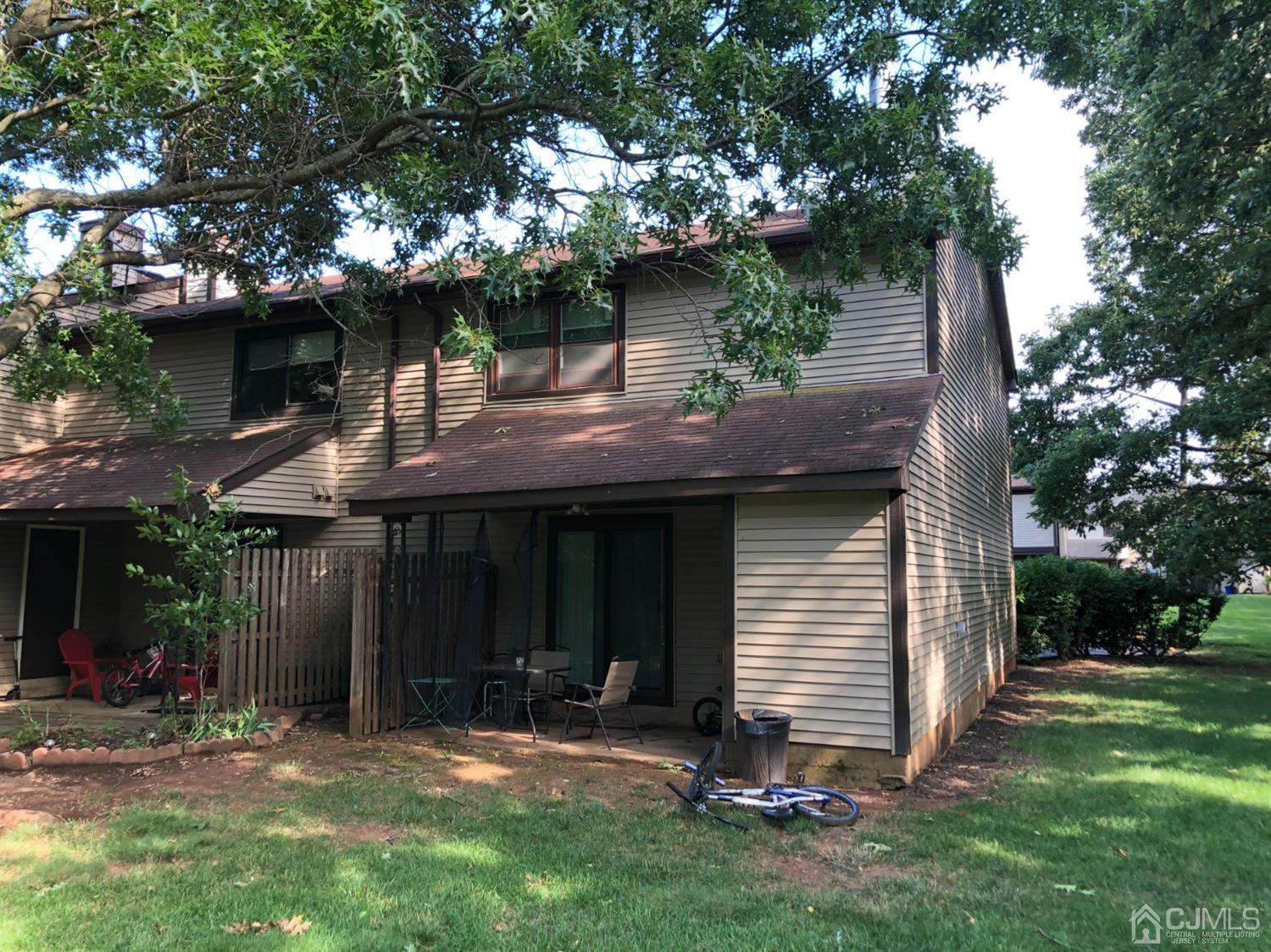 8201 Hana Road Edison, NJ 08817 - Photo 3 of 15 a view of a house with a yard and tree