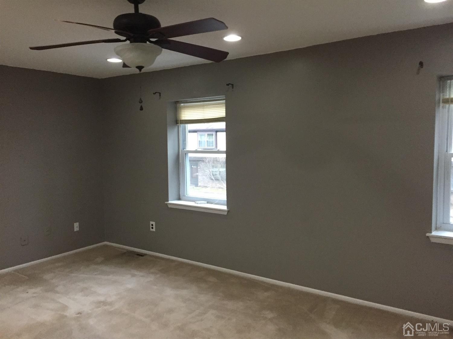 8201 Hana Road Edison, NJ 08817 - Photo 8 of 15 an empty room with a window