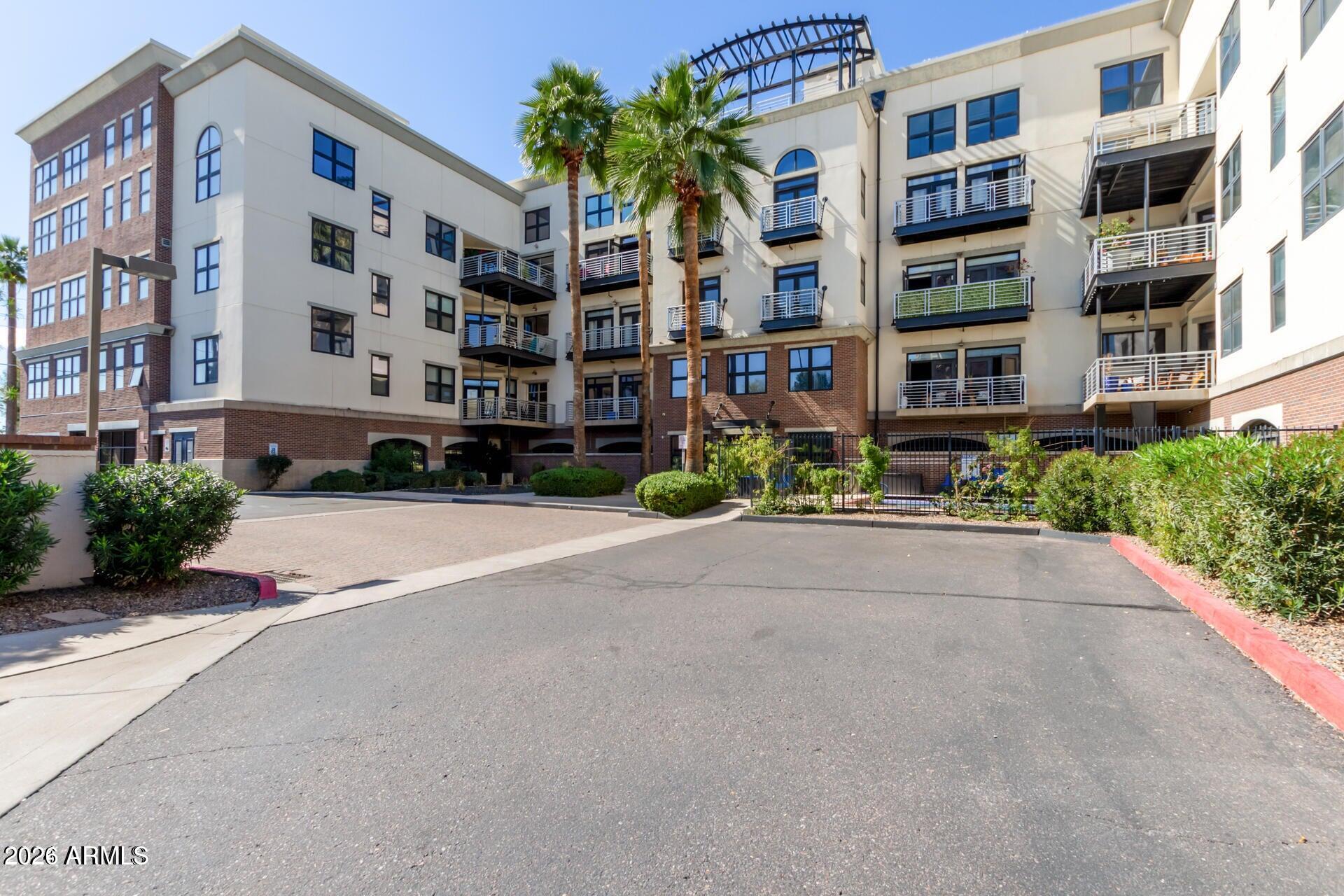 914 East Osborn Road, Unit 403 Phoenix, AZ 85014 - Photo 1 of 49 a front view of a building with a street