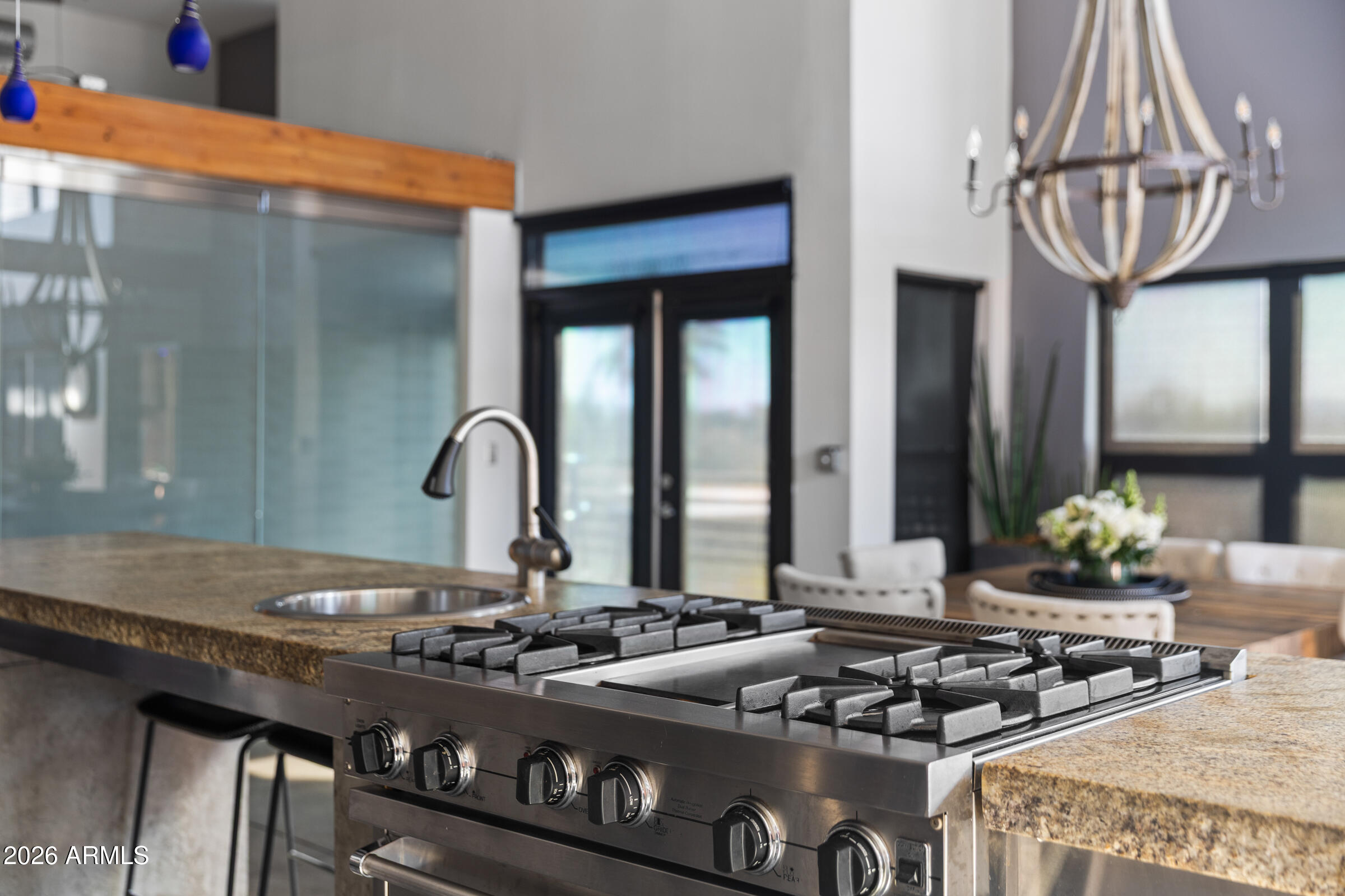 914 East Osborn Road, Unit 403 Phoenix, AZ 85014 - Photo 11 of 49 a kitchen with a stove and a sink
