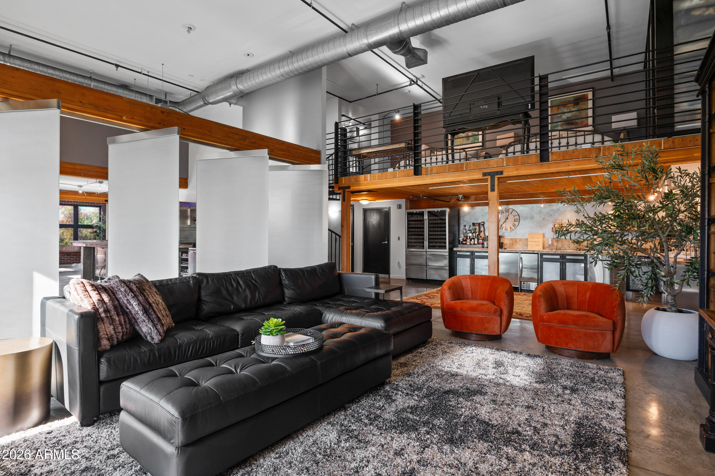 914 East Osborn Road, Unit 403 Phoenix, AZ 85014 - Photo 17 of 49 a living room with furniture
