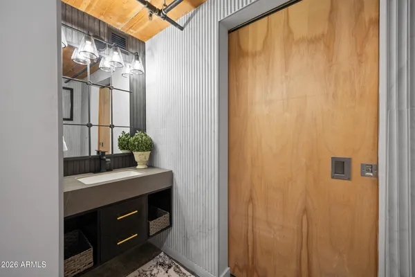 a view of a living room and a flat screen tv