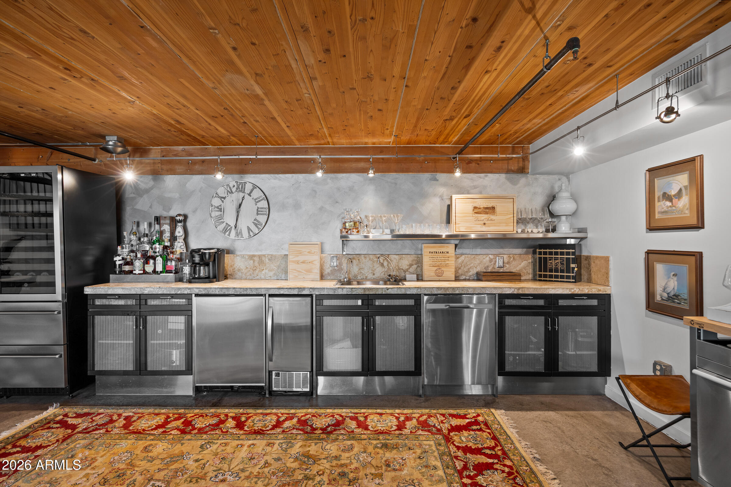 914 East Osborn Road, Unit 403 Phoenix, AZ 85014 - Photo 25 of 49 a kitchen with stainless steel appliances granite countertop a stove and cabinets