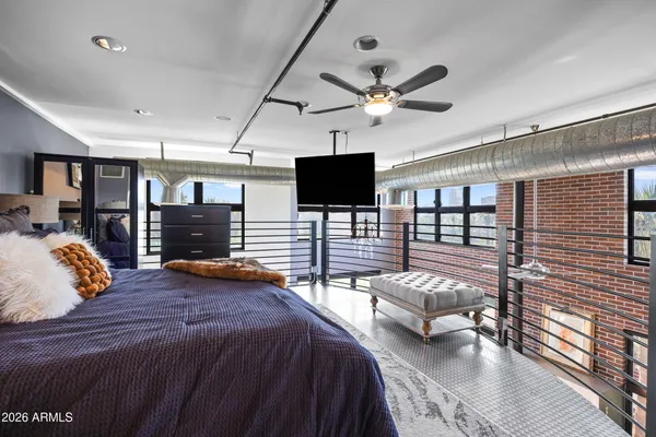 a bed room with a bed and a walk in closet