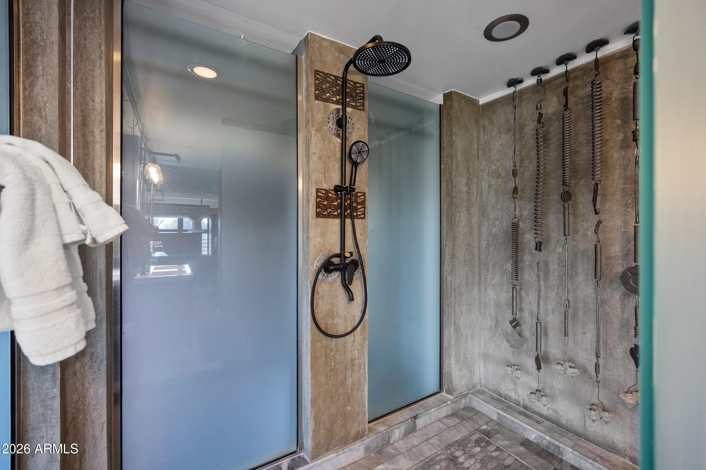 914 East Osborn Road, Unit 403 Phoenix, AZ 85014 - Photo 34 of 49 a bathroom with a shower