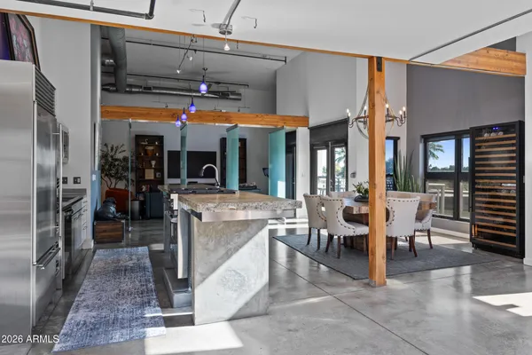 a view of a living room and entry way