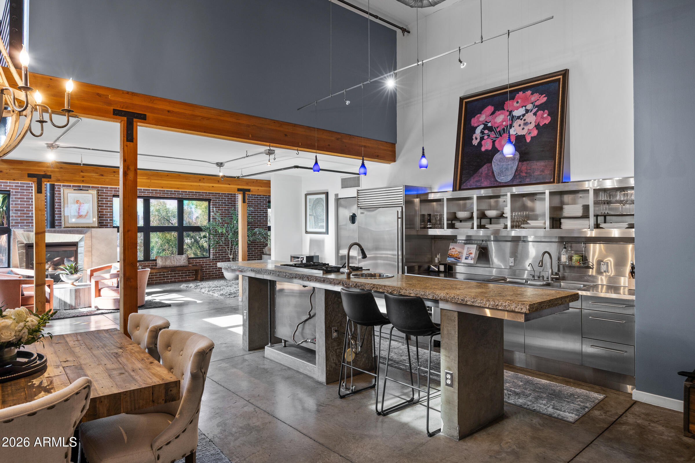 914 East Osborn Road, Unit 403 Phoenix, AZ 85014 - Photo 7 of 49 a room with stainless steel appliances lots of wooden furniture