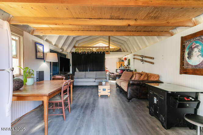 1015 Mountain Quail Road Calpine, CA 96124 - Photo 28 of 34 a living room with furniture and a flat screen tv