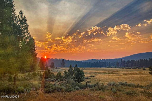 a view of a lake and a yard