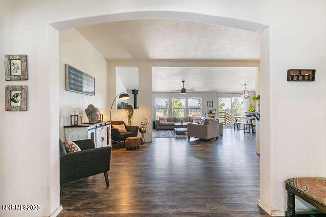 1015 Mountain Quail Road Calpine, CA 96124 - Photo 9 of 34 a living room with furniture and a wooden floor