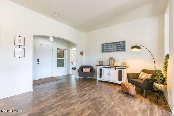 1015 Mountain Quail Road Calpine, CA 96124 - Photo 10 of 34 a view of living room with furniture and wooden floor