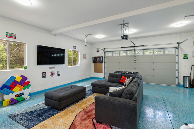 755 South Zion Ridge Drive Orderville, UT 84758 - Photo 82 of 84 Living room with a garage and speckled floor