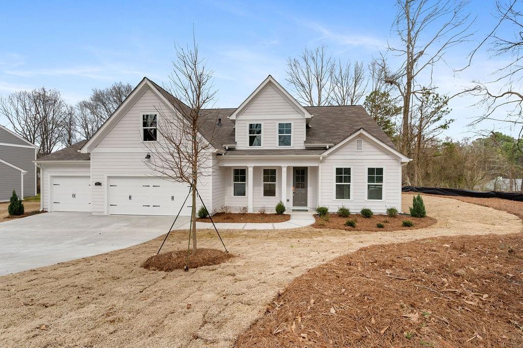 891 Cole Creek Road Dallas, GA 30157 - Photo 1 of 1 a front view of a house with a yard