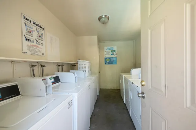 a bed room with a bed and a couch