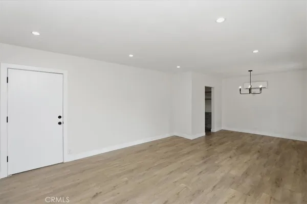 a kitchen with stainless steel appliances a stove a sink and a microwave