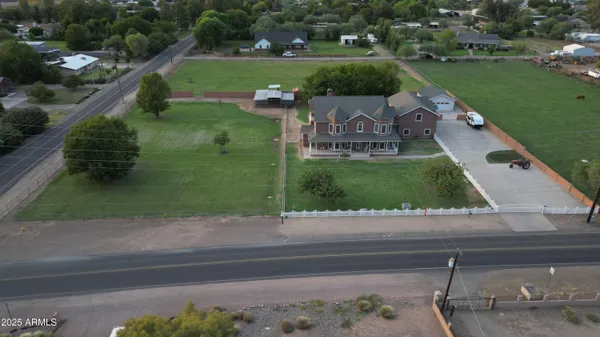 a view of a lake with a floor to ceiling window and outdoor space