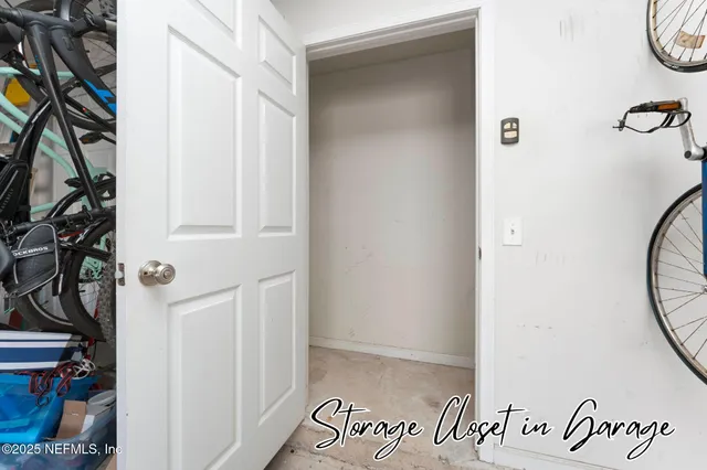 an aerial view of a residential houses with outdoor space