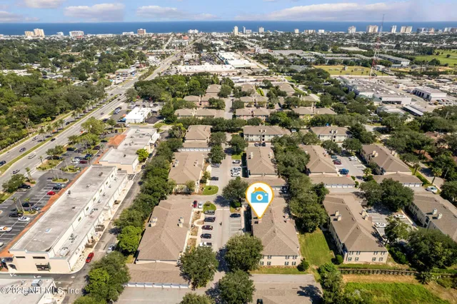 a view of a swimming pool with a fountain and a fountain