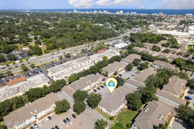 a view of a swimming pool with a yard