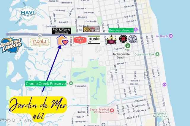 a view of empty room with wooden floor and fireplace