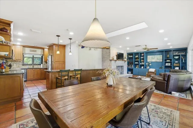 a bed room with a bed and a large window