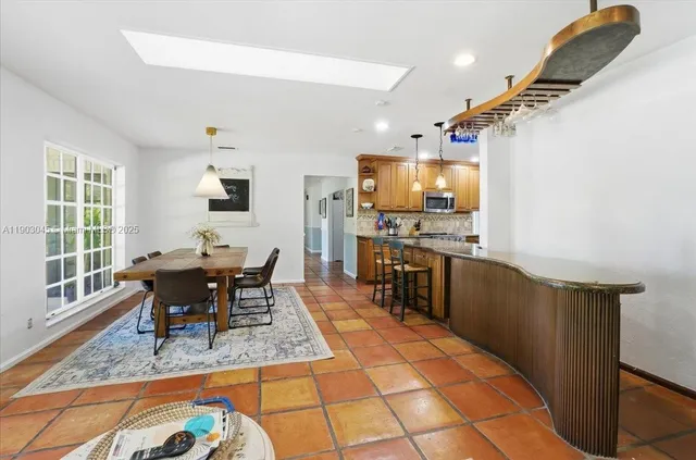 a bed room with bed and a flat tv screen