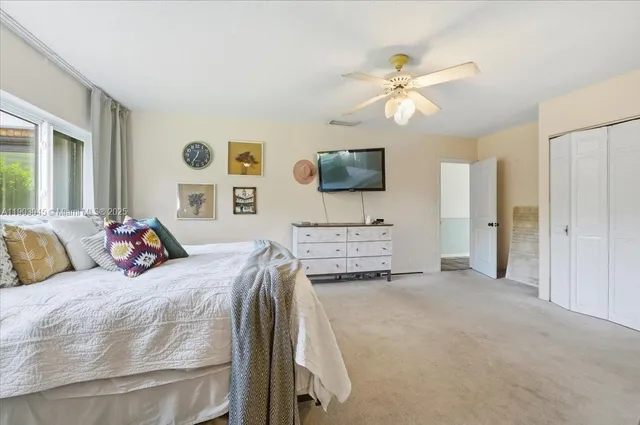 a bed room with a bed and a couch