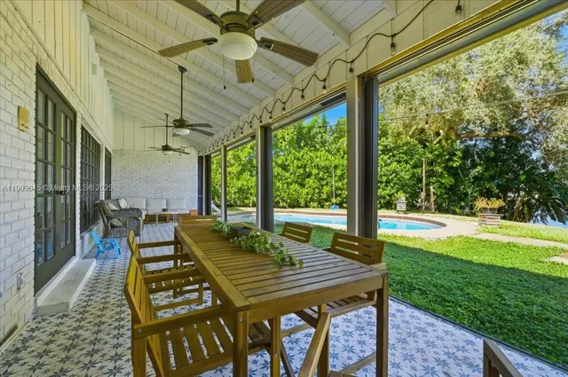 a view of pool and wooden deck