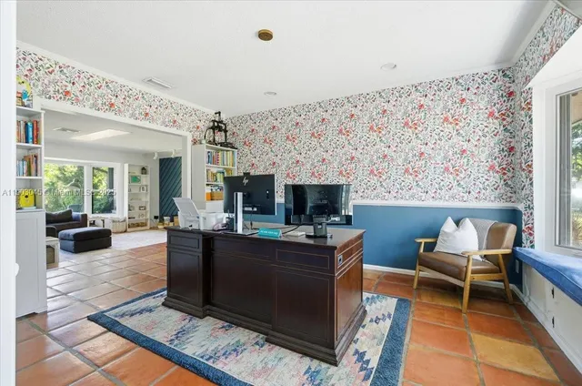 a view of a dining room with furniture window and outside view