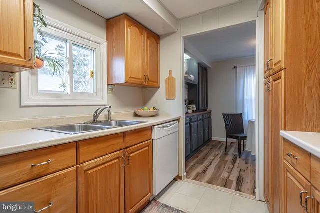 a utility room with closet dryer and washer