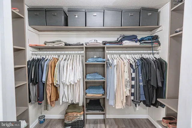 a view of a kitchen from a hallway