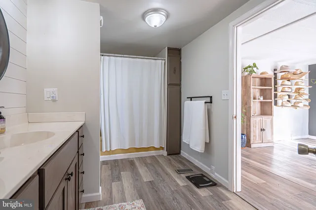 a bed room with a bed and a window