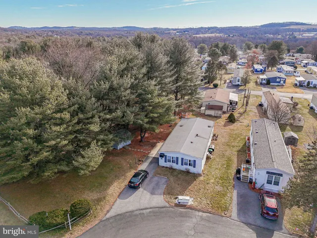 an aerial view of residential house with outdoor space