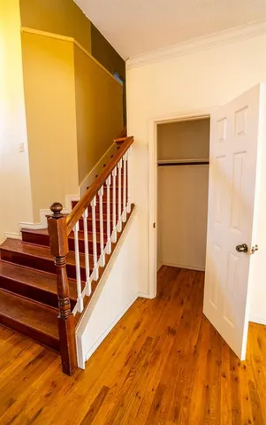 a view of entryway with wooden floor