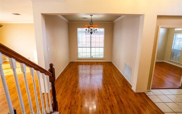 a view of entryway with wooden floor